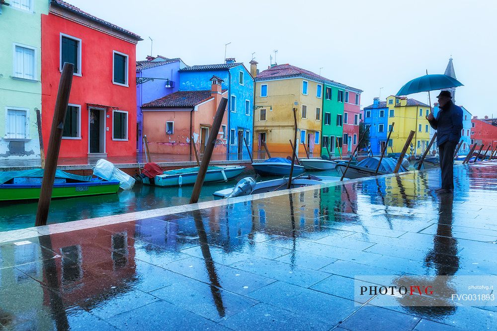 Raining in the Burano island, a typical village in the Venetian islands, Venice, Italy