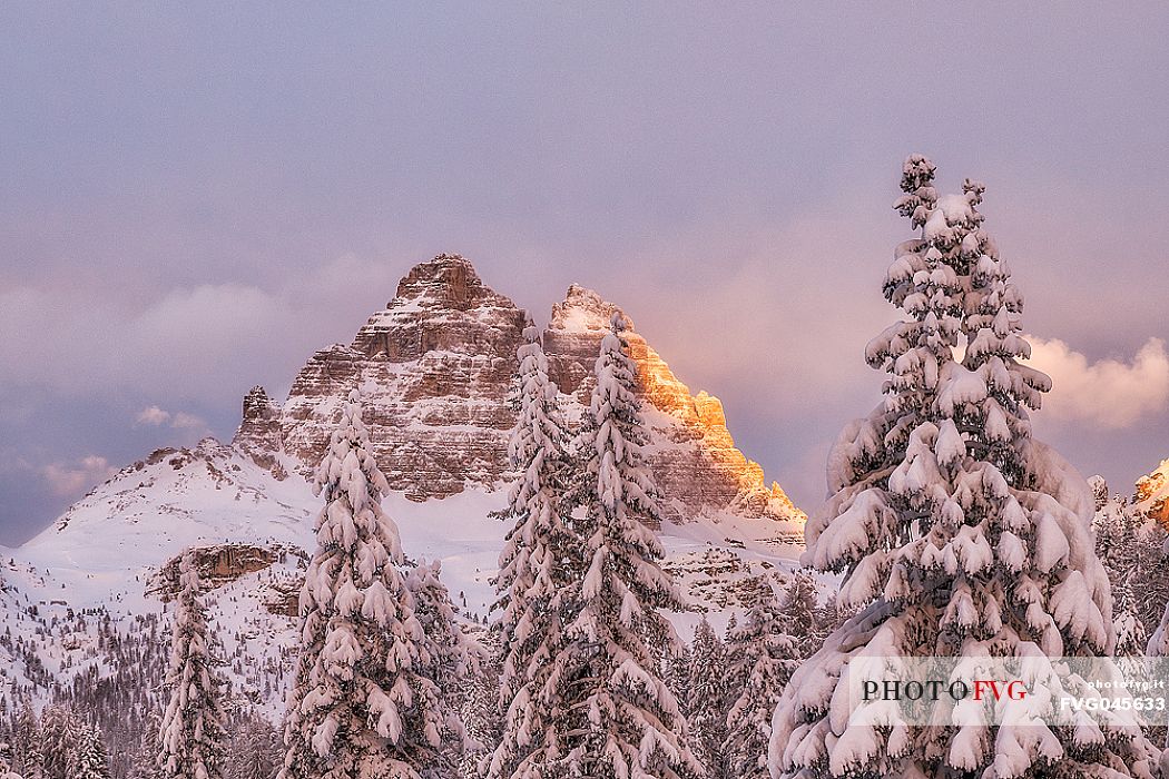 View of Tre Cime di Lavaredo peak from lake Antorno at sunset, dolomites, Misurina, Veneto, Italy, Europe