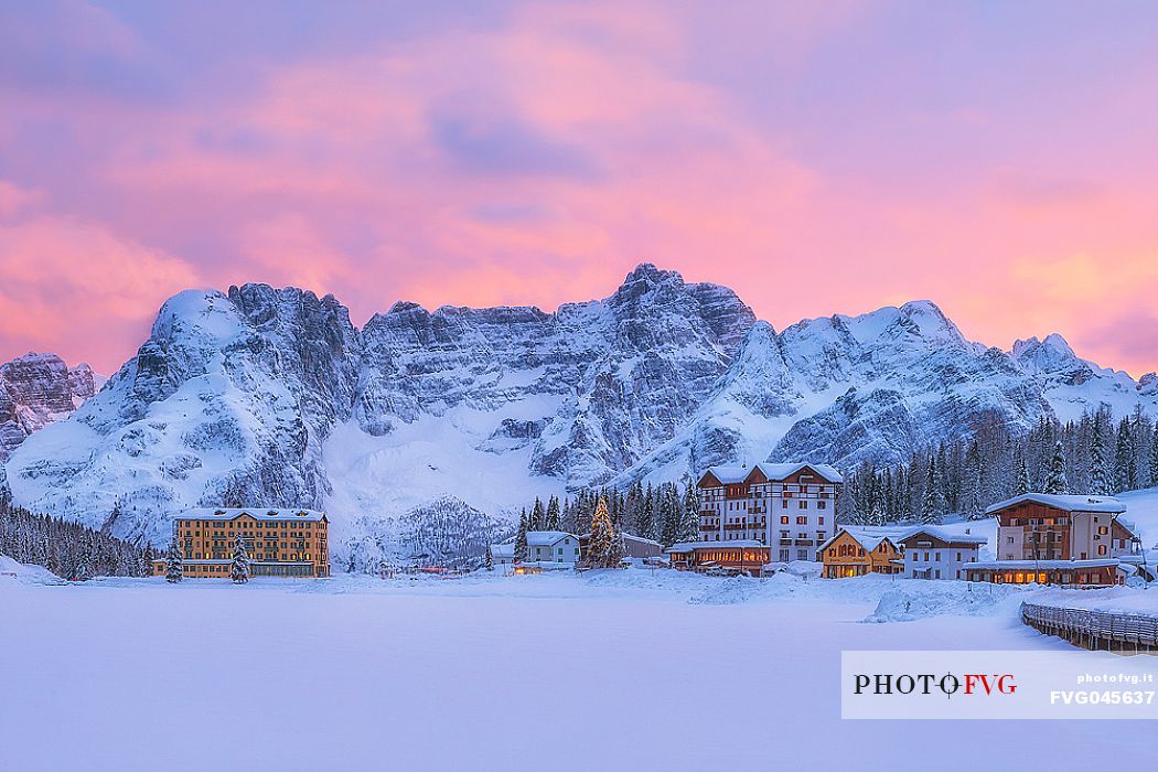 Winter sunset in lake Misurina with Sorapiss mountain range, dolomites, Veneto, Italy, Europe