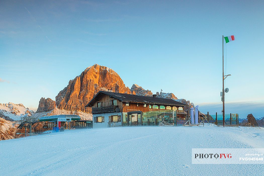 Scoiattoli mountain hut and Tofana mount in a winter sunset, Cortina d'Ampezzo, dolomites, Veneto, Italy, Europe