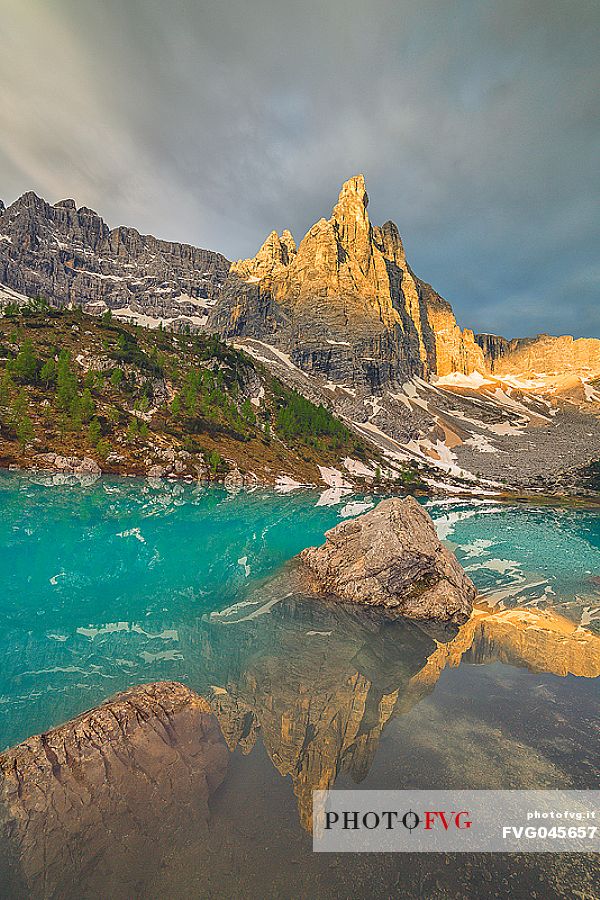 Sorapiss Lake against Dito di Dio peak at sunrise, Cortina d'Ampezzo, Dolomites, Veneto, Italy, Europe