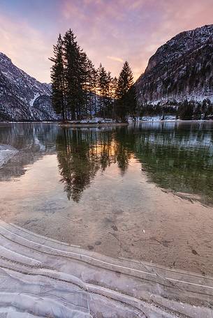 colourful sunset on lake Predil