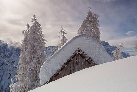 Cottage under snow in Sanctuary Mont Lussari