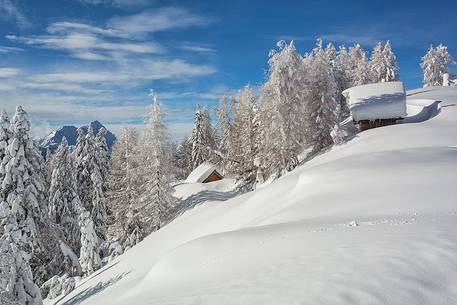 Cottage under snow near Sanctuary Mont Lussari