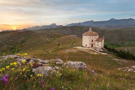 The church of Madonna della Pieta near Rocca Calascio, background Gran Sasso mountain range The church of Madonna della Pieta near Rocca Calascio, background Gran Sasso mountain range