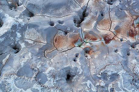 Solfatara is a shallow volcanic crater at Pozzuoli, near Naples, part of the Campi Flegrei volcanic area