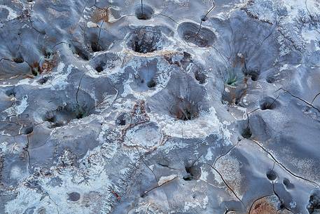 Solfatara is a shallow volcanic crater at Pozzuoli, near Naples, part of the Campi Flegrei volcanic area