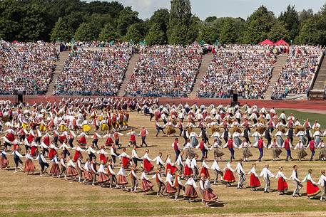 This is the story of time manifesting itself in our ancestors heritage and us shaping our time through our own touches, contacts, caresses and impacts.
Song and dance celebrations are an old and very important tradition for Estonia and Estonians (the first song celebration took place in 1869 and the first dance celebration in 1934) and these celebrations are nowadays held every five years. In 2003 our tradition of song and dance celebrations was entered to UNESCOs List of Intangible Cultural Heritage.