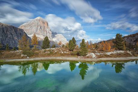 Autumn in lake Limides (or Limedes), and in the background Tofana mountains (Tofana di Rozes)