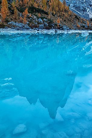 Punta Sorapiss is reflected on the Sorapiss lake, Cortina d'Ampezzo, dolomites, Italy Punta Sorapiss is reflected on the Sorapiss lake, Cortina d'Ampezzo, dolomites, Italy