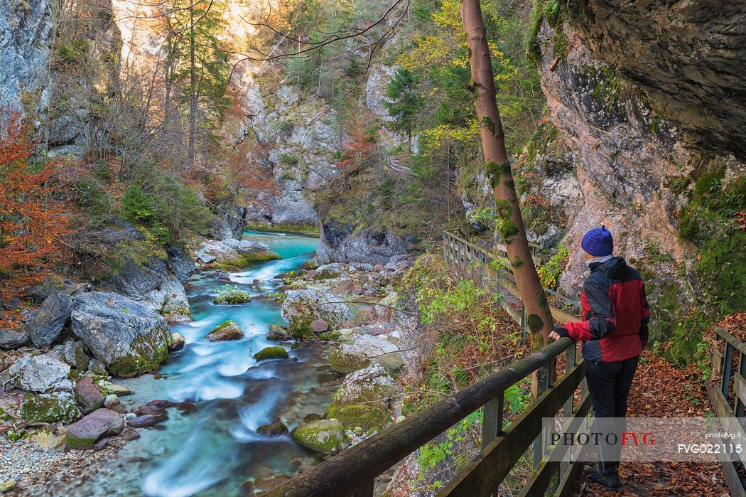 Hiker in the Orrido of Slizza, s a beautiful water trail, Tarvisio, Friuli Venezia Giulia, Italy Hiker in the Orrido of Slizza, s a beautiful water trail, Tarvisio, Friuli Venezia Giulia, Italy