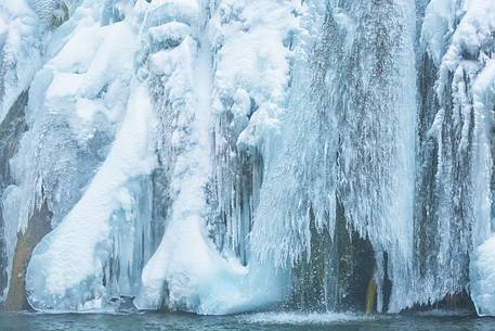 Frozen lakes and waterfalls in Plitvice Lakes National Park, Croatia