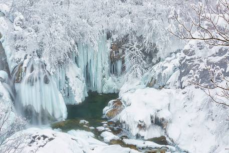 Frozen lakes and waterfalls in Plitvice Lakes National Park, Croatia