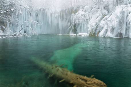 Frozen lakes and waterfalls in Plitvice Lakes National Park, Croatia