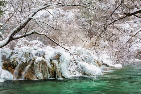 Frozen lakes and waterfalls in Plitvice Lakes National Park, Croatia