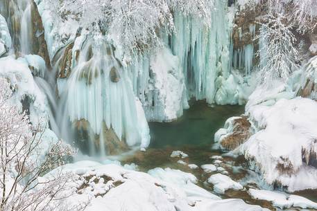 Frozen lakes and waterfalls in Plitvice Lakes National Park, Croatia