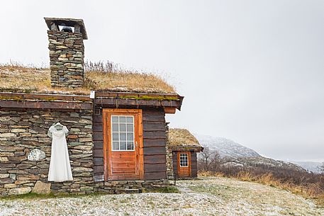 Wedding dress hanging out of the raditional building in Harahorn, Norway