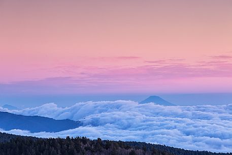 Etna, sunrise from Sartorius mountais, forward volcano Stromboli in the background,Sicily, Italy