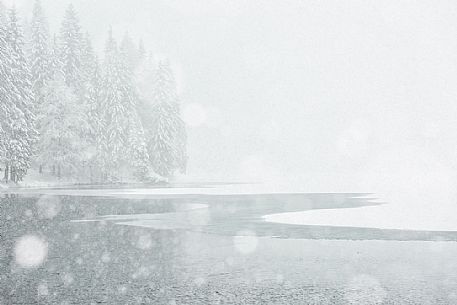 Fusine lake under the snowfall, Tarvisio, Italy