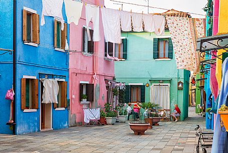 Lifestyle in Burano village where every house is painted different color, Venice, Italy