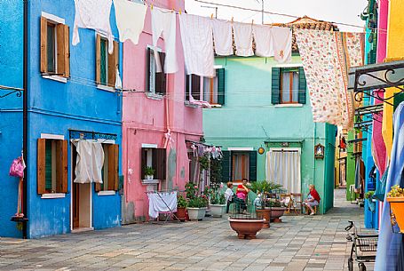 Lifestyle in Burano village where every house is painted different color, Venice, Italy Lifestyle in Burano village where every house is painted different color, Venice, Italy