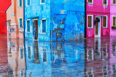 Raining in the Burano island, a typical village in the Venetian islands, Venice, Italy Raining in the Burano island, a typical village in the Venetian islands, Venice, Italy