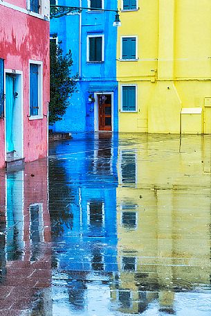 Raining in the Burano island, a typical village in the Venetian islands, Venice, Italy Raining in the Burano island, a typical village in the Venetian islands, Venice, Italy