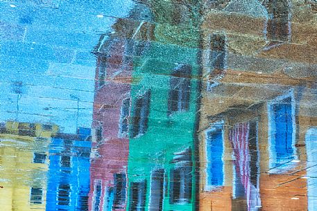 Unusual view of Burano village where every house is painted different color, Venice, Italy