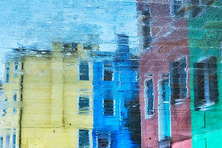 Unusual view of Burano village where every house is painted different color, Venice, Italy