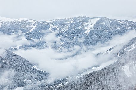 The Brunnach ski area and the St Oswald village in the clouds, Bad Kleinkirchheim, Carinthia, Austria, Europe The Brunnach ski area and the St Oswald village in the clouds, Bad Kleinkirchheim, Carinthia, Austria, Europe