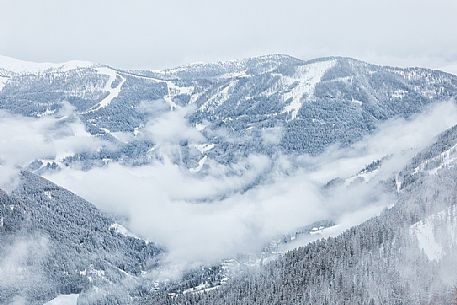 The Brunnach ski area and the St Oswald village in the clouds, Bad Kleinkirchheim, Carinthia, Austria, Europe