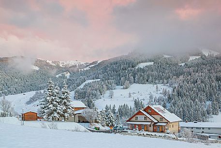 The snowy village of Bad Kleinkirchheim at sunset, Carinthia, Austria, Europe