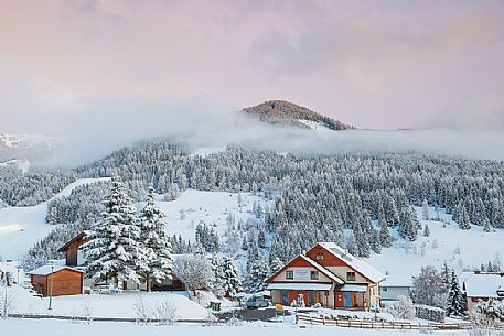 The snowy village of Bad Kleinkirchheim at sunset, Carinthia, Austria, Europe