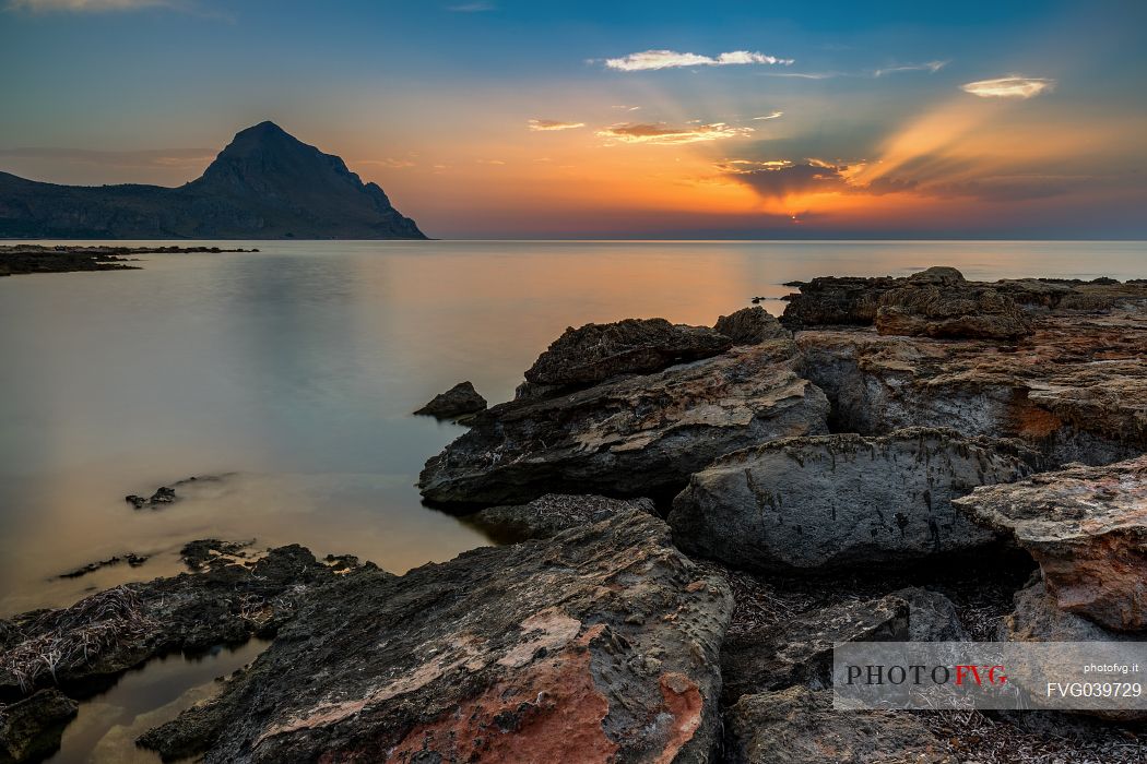 Sunset from the Monte Cofano nature Reserve, in the background the Monte Cofano  peak, Trapani, Sicily, Italy