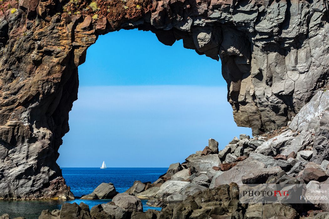 Perciato rock bridge, near to Pollara bay, Salina island, Aeolian islands, Sicily, Italy