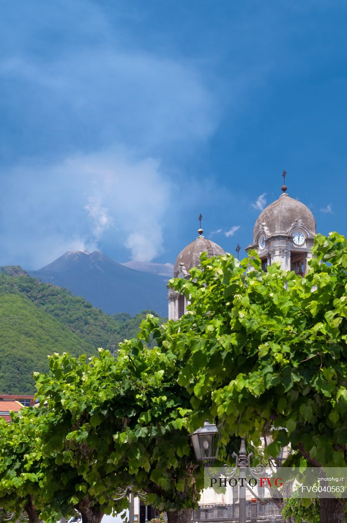 Etna volcano with the dome of the church of Zafferana Etnea, Catania, Sicily, Italy, Europe