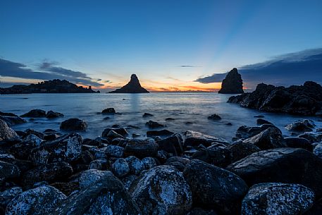 Lachea island and Faraglioni of Aci Trezza at dawn, Ciclopi archipelago, Sicily, Italy, Europe Lachea island and Faraglioni of Aci Trezza at dawn, Ciclopi archipelago, Sicily, Italy, Europe