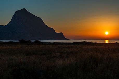 Monte Cofano Mountain Natural Reserve at sunset, Sicily, Italy Monte Cofano Mountain Natural Reserve at sunset, Sicily, Italy