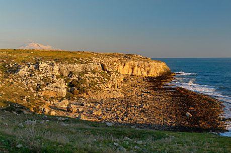 Siracusa coastline and in the background the Monte Etna covered by snow, Sicily, Italy, Europe