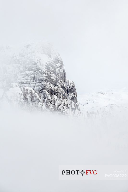 Monte Poviz peeps out from fog