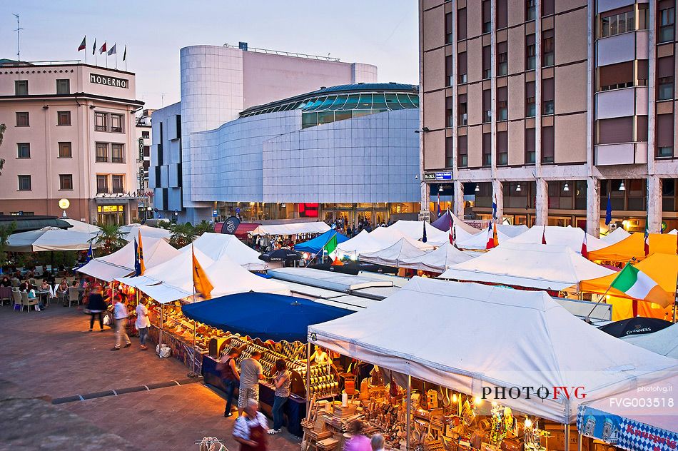 The European market festival in XX and in the background the Verdi Theater, Pordenone, Friuli Venezia Giulia, Italy, Europe