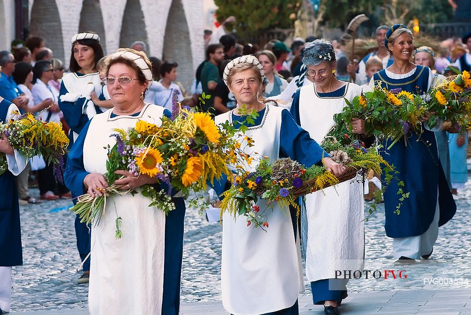 Parade with medieval clothes along the town streets in Spilimbergo during the historical reenactment of the Macia, Friuli Venezia Giulia, Italy, Europe