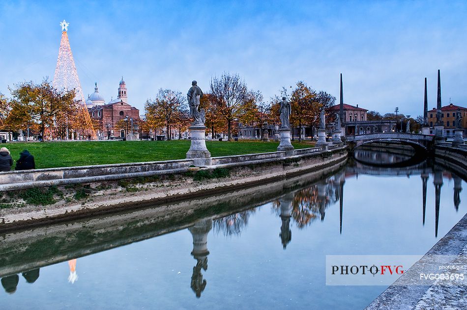 Christmas lights in Prato della Valle, in the background the Basilica of Saint Giustina, Padua, Italy, Europe