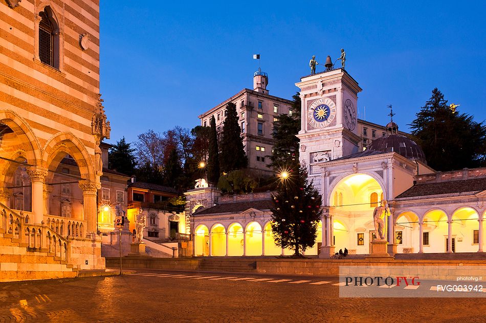 Loggia di San Giovanni, the Renaissance portico surmounted by a clock tower and in the background the castle, Piazza della Libert, Udine, Friuli Venezia Giulia, Italy, Europe 