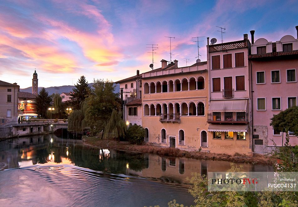 Sunset on the Livenza river that crosses the city of  Sacile. A town known as the Garden of the Serenissima, Friuli Venezia Giulia, Italy, Europe