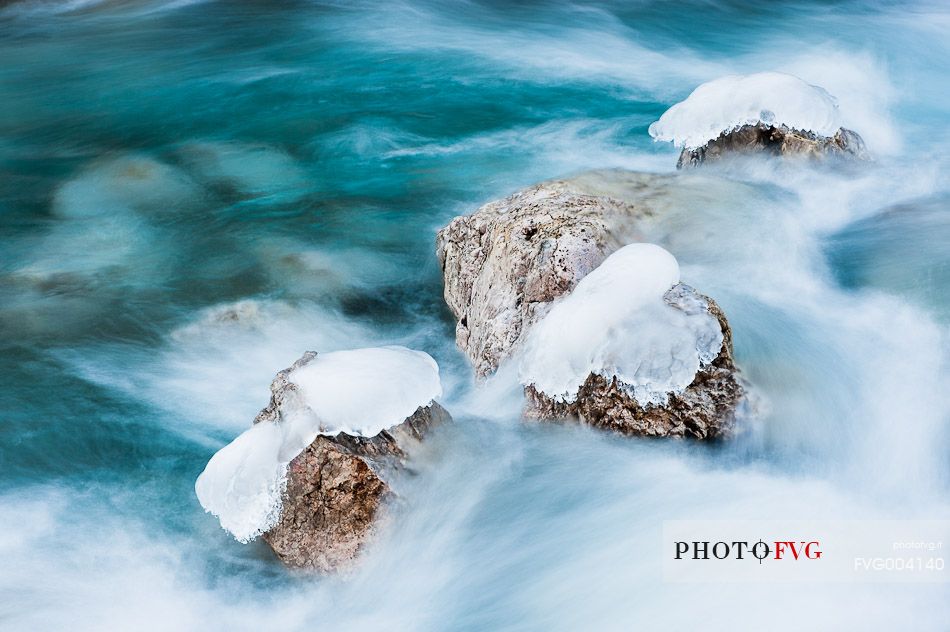 Ice formations in the Cordevole River, Cadore, dolomites, Italy, Europe