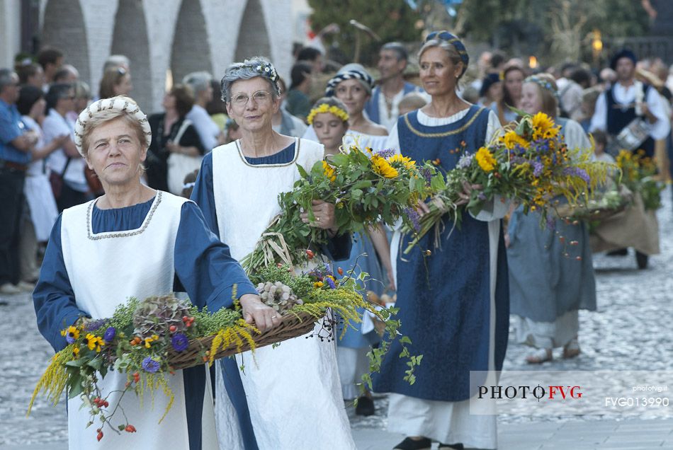 Parade with medieval clothes along the town streets in Spilimbergo during the historical reenactment of the Macia, Friuli Venezia Giulia, Italy, Europe