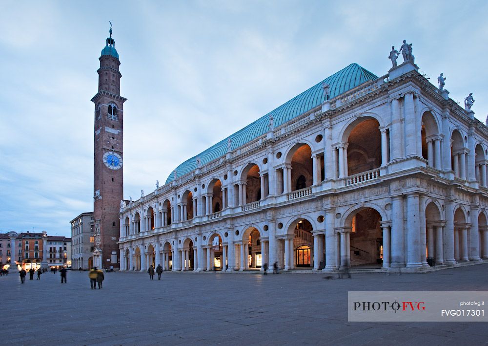 The Palladian Basilica, symbol of Vicenza, and Bissara tower in Piazza dei Signori, Vicenza, Veneto, Italy, Europe