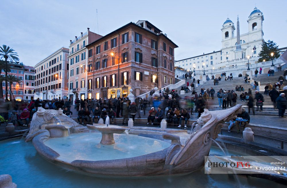 Piazza di Spagna, at the bottom of the Spanish Steps, is one of the most famous squares in Rome. In the foreground the famous Fountain Barcaccia (Bernini). Rome, Italy, Europe