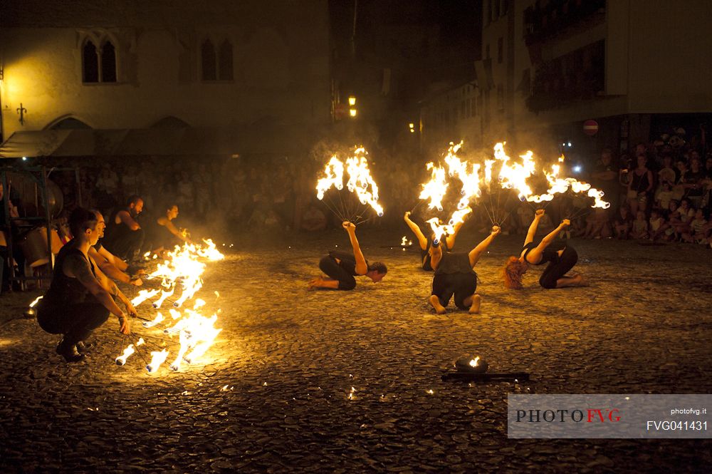 At the historical re-enactment of Macia in Spilimbergo, people play juggling games with fire, Friuli Venezia Giulia, Italy